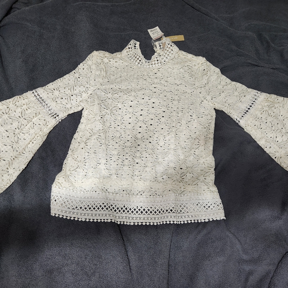 Beautiful XL white colored shirt with bell sleeves.